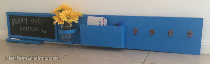 Blue shelf with blackboard, mail holder, mason jar space and hooks? Ok.